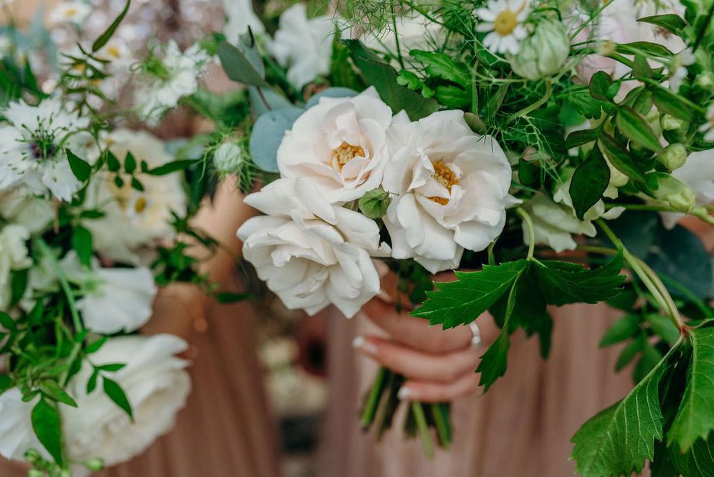 close up or bride's wedding bouquet